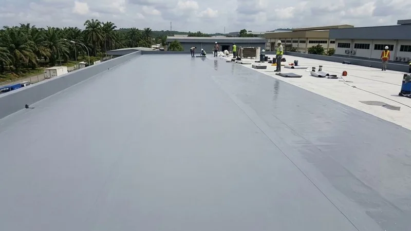 Completed waterproofing project showing pristine sealed flat roof surface protecting a Malaysian residential property